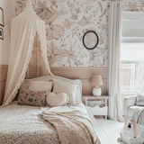 "Odette Wallpaper by Wall Blush showcasing elegant floral design in a cozy bedroom setting, perfect for a serene ambiance."