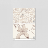 "Odette Wallpaper sample with botanical print from Wall Blush in a neutral living room setting, highlighting wall decor."