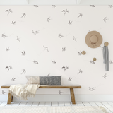 "Wall Blush's Of a Feather (Eggshell) Wallpaper in a modern styled living room, accentuating a serene wall decor."