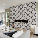 "Pearl Wallpaper by Wall Blush in a modern living room, accent wall focus with fireplace"