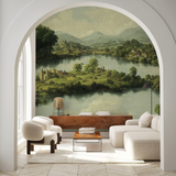 "Piedmont Wallpaper by Wall Blush installed in a modern living room, showcasing serene landscape design as focal point."