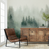 "Wall Blush Pinetop Wallpaper featured in a stylish living room setting, showcasing a serene forest design."