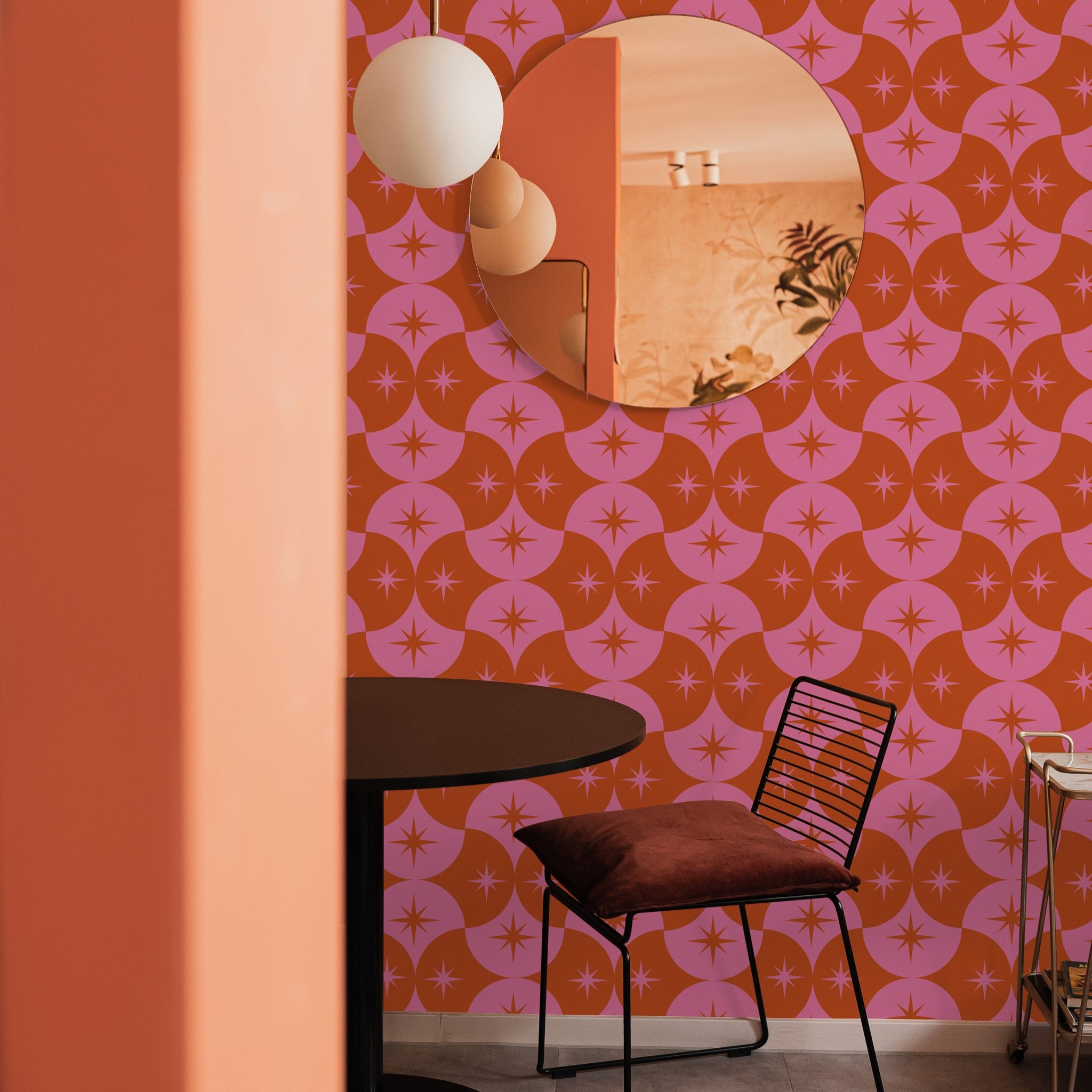 Alt text: "Margot Wallpaper by Wall Blush featured in stylish modern living room, highlighting vibrant patterned wall decor."