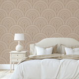"Wall Blush's Rae Wallpaper in a cozy bedroom, highlighting elegant beige patterned design on the feature wall."