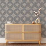 "Wall Blush Reality Star (Blue) Wallpaper in a modern living room with stylish wooden dresser and decor accents."