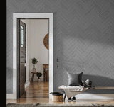 See You Slater Wallpaper from The Kail Lowry Line in a stylish, modern entryway, with a focus on the elegant herringbone pattern.
