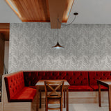 "Wall Blush Shea Wallpaper enhancing the dining area with its elegant pattern and texture."