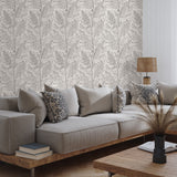 "Elegant Shea Wallpaper by Wall Blush, highlighting a botanical design in a stylish living room setting."