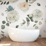 Modern bathroom adorned with 'Sidney With Love Wallpaper' from The Tamra Judge Line, emphasizing floral design.
