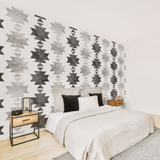"Stevie Wallpaper by Wall Blush in a modern bedroom, highlighting geometric patterns as the focal decor."