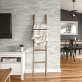 "Strauss Wallpaper by Wall Blush accentuating modern dining room decor, with focus on elegant textured design."