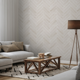 "Wall Blush Sweet Cream Wallpaper in a modern living room, herringbone pattern, focus on the elegant wall texture."