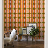 "Wall Blush's THAT GIRL Wallpaper in modern home office, vivid geometric pattern as room focus"