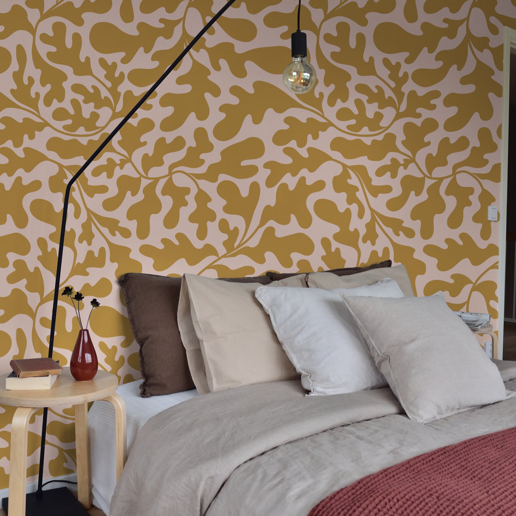 "Tawnie Wallpaper by Wall Blush in cozy bedroom with focus on the elegant patterned wall decor"