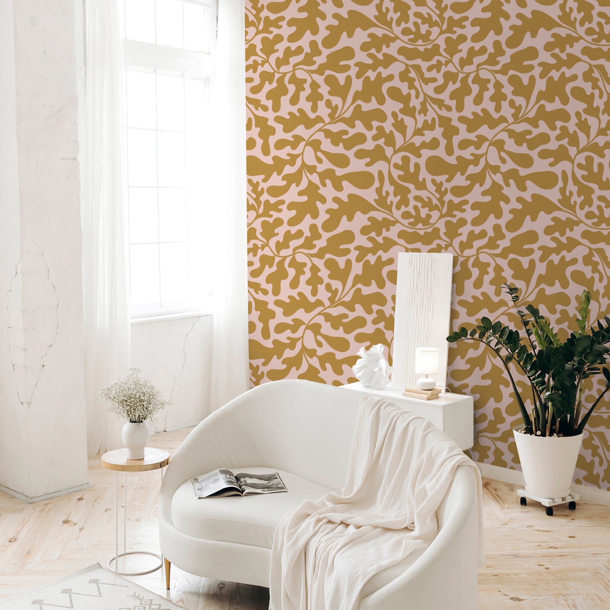 "Tawnie Wallpaper by Wall Blush in elegant living room with modern white sofa and decor accents."