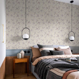 "Wall Blush's The Cheery Wallpaper in a cozy bedroom, highlighting the elegant bird pattern design."