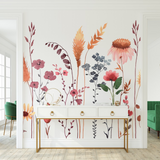 "Wall Blush's Untamed Wallpaper highlighting vibrant floral patterns in a stylish modern living room setting, focusing on wall decor."