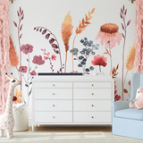 "Wall Blush's Untamed Wallpaper featuring floral design in a stylish children's bedroom, accentuating the room's decor."