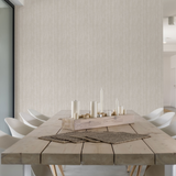"Wall Blush Utopia Wallpaper showcased in a modern dining room setting, emphasizing texture and elegance."