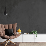 "Modern living room featuring Wall Blush's Void Wallpaper, highlighting elegant dark texture wall design."