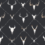 "Wall Blush's Wyatt Wallpaper featuring antler motif in a stylish room setting, the primary focus on the wall design."