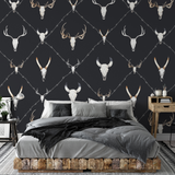 "Wall Blush's Wyatt Wallpaper in stylish bedroom, focus on modern antler design pattern."