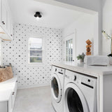 Wall Blush You + Me Wallpaper in a laundry room with white appliances and modern decor focus.
