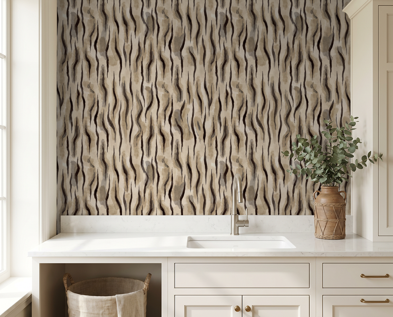 Abstract wavy wallpaper with earthy taupes and charcoal in a modern kitchen.
