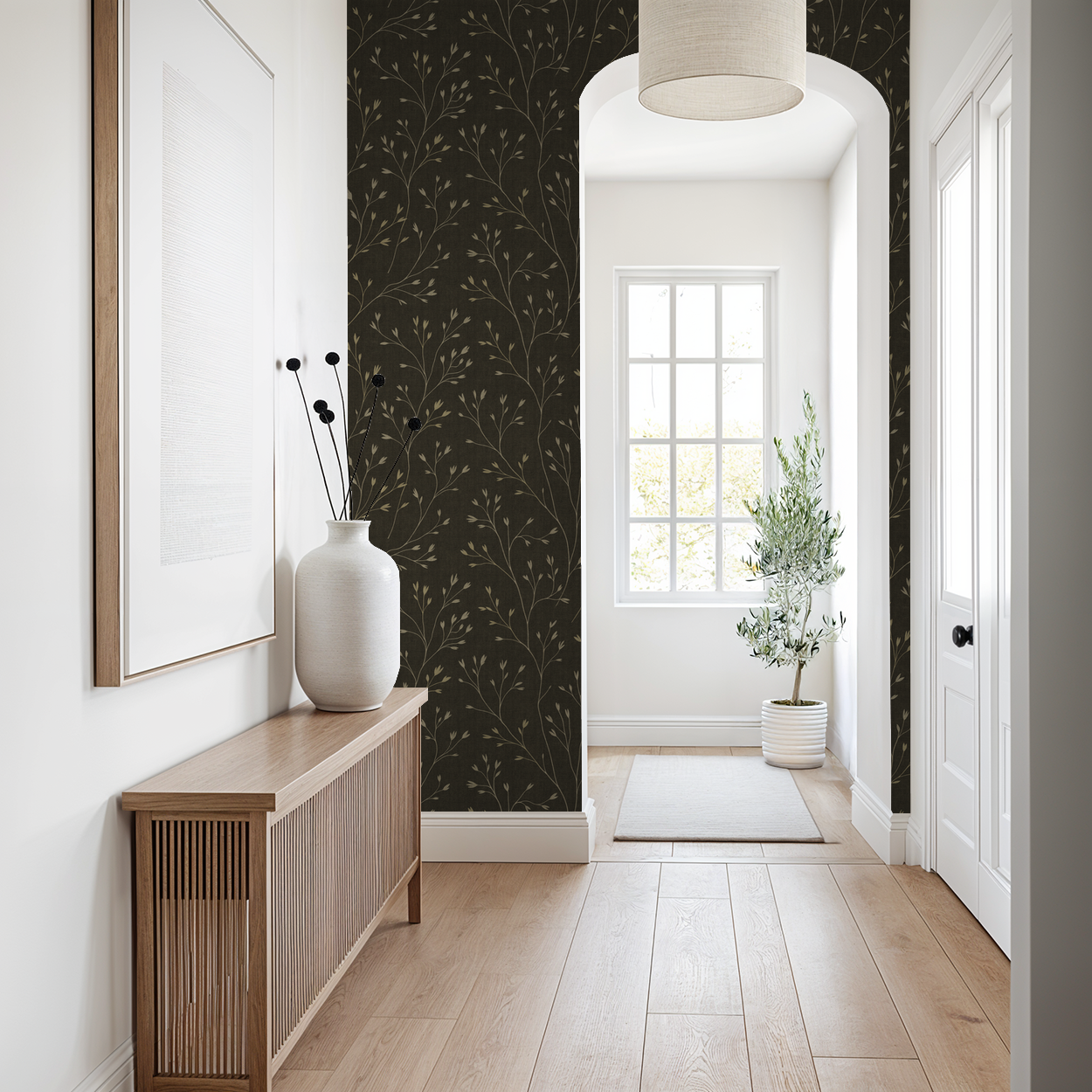 Ashwood wallpaper with cream branches on brown in a modern hallway.