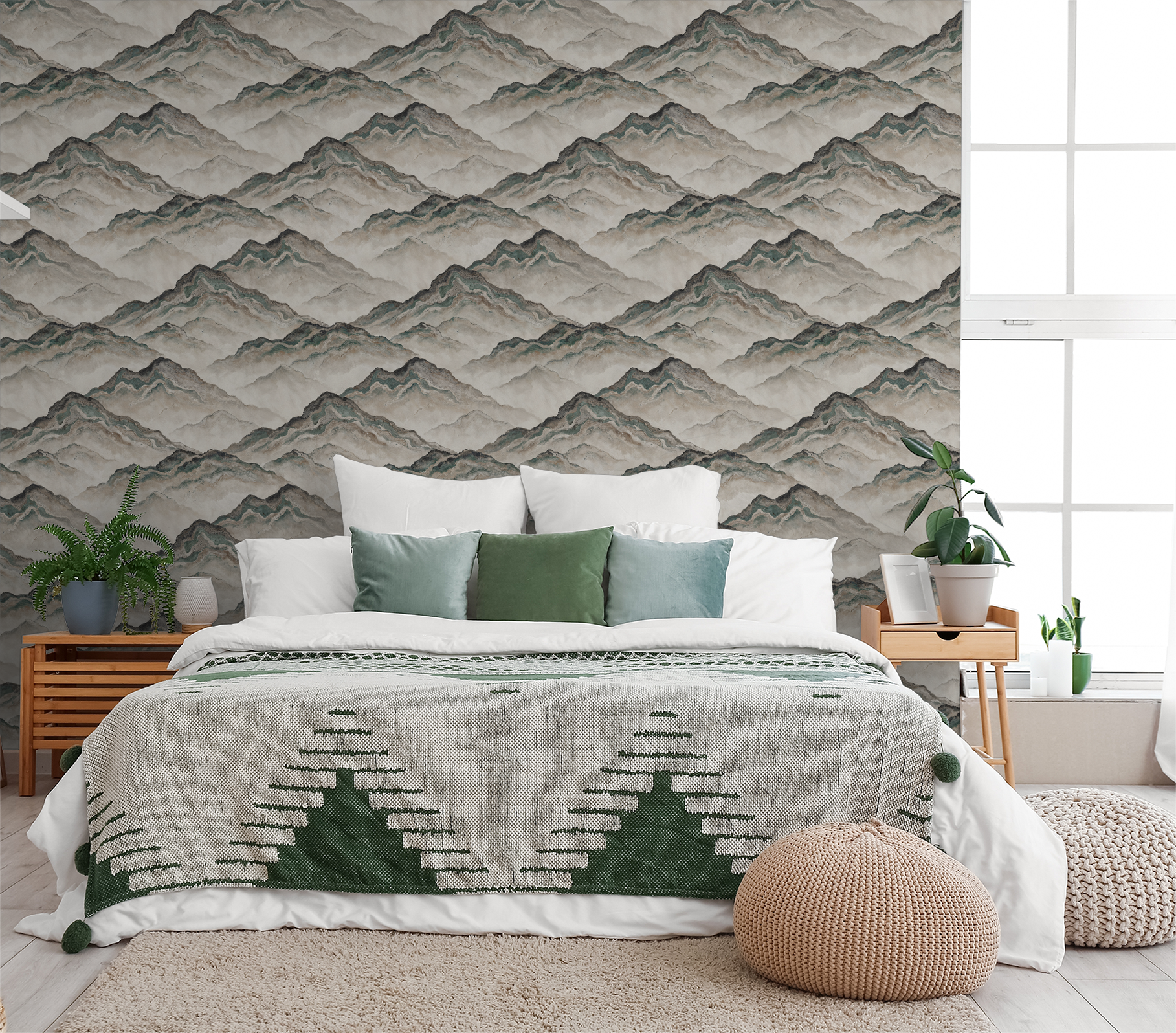 Aurith mountain pattern wallpaper in earthy tones in a cozy bedroom with green accents.