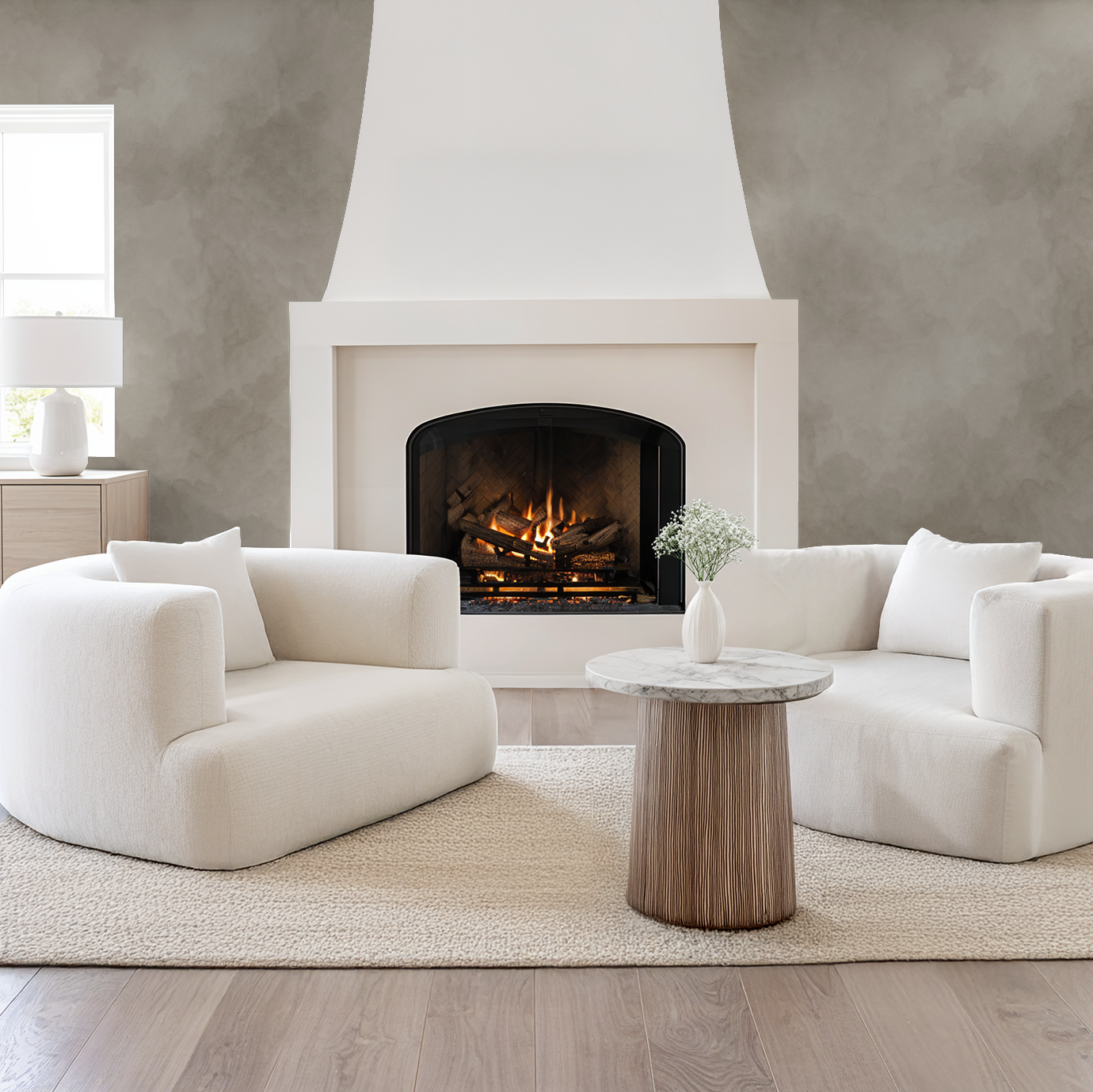 Beige abstract cloud-like wallpaper in modern living room with fireplace and white furniture.