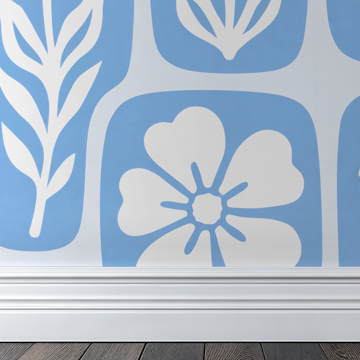Blue wallpaper with white floral silhouettes and leaves in a modern room setting.