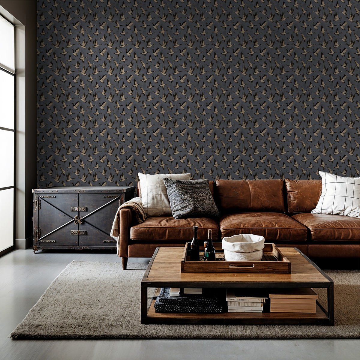 Blue wallpaper with geese pattern in modern living room with leather sofa.
