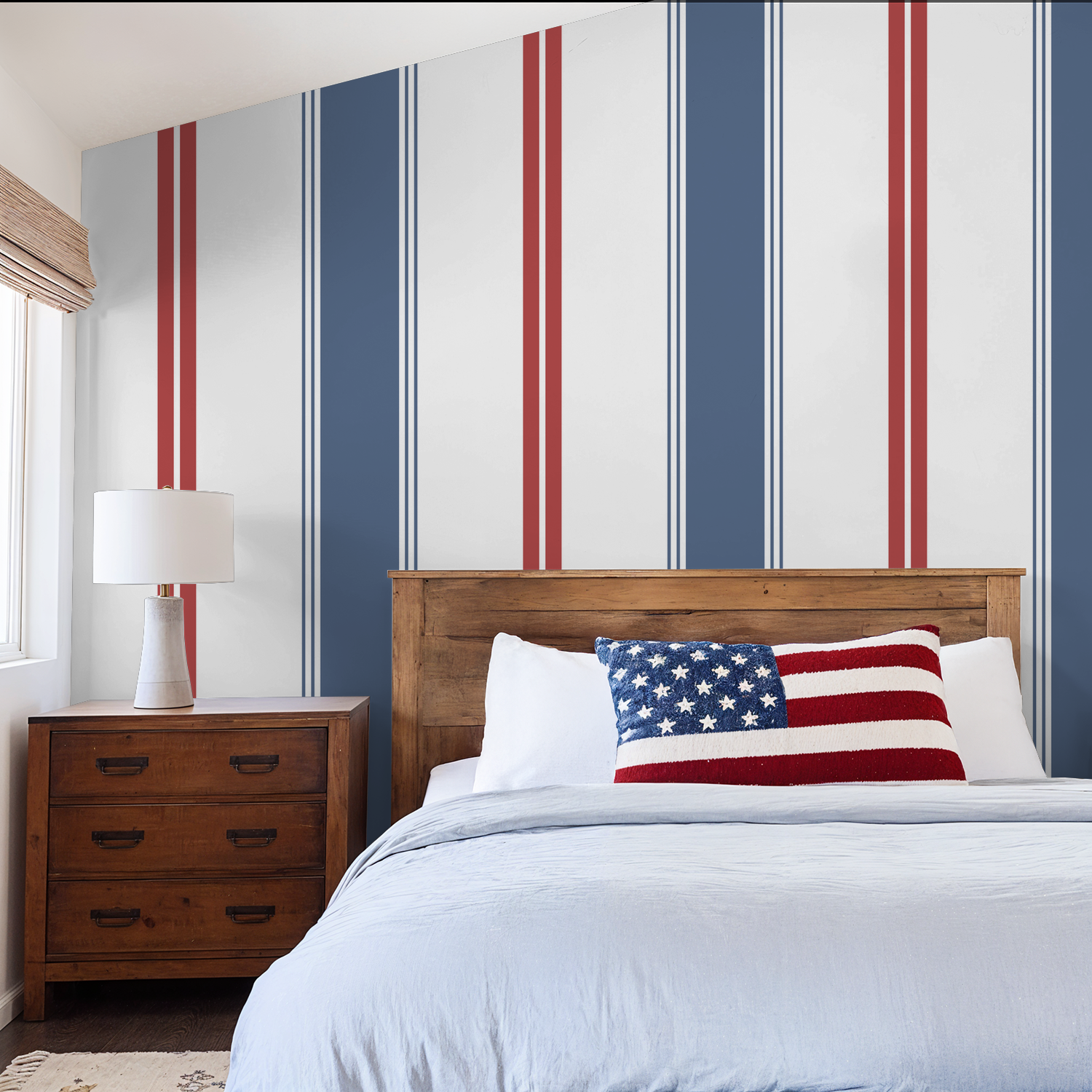 Blue and red striped wallpaper in a modern bedroom with wooden furniture.