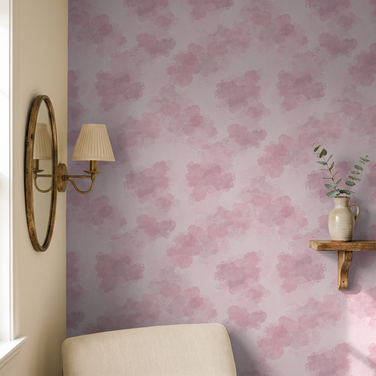 Blush pink watercolor cloud wallpaper in elegant room with mirror and shelf.