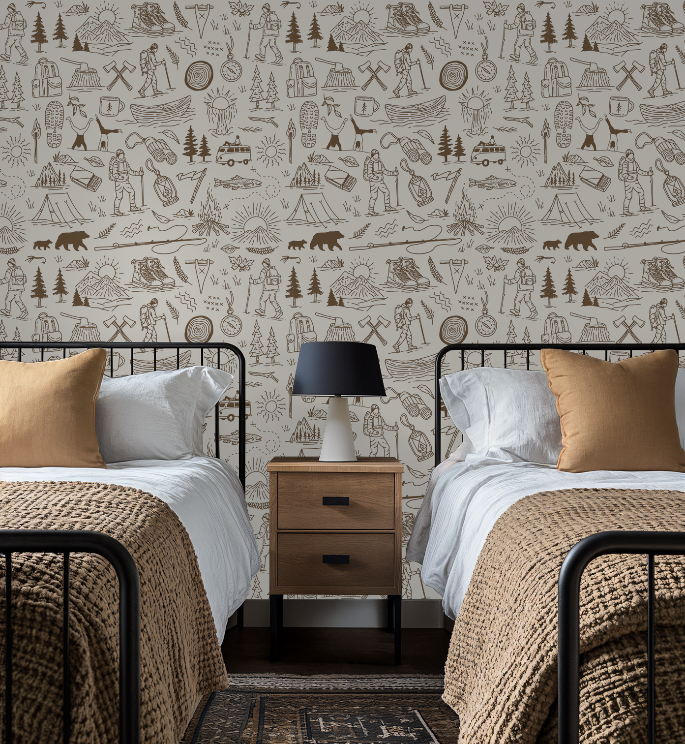Rustic brown and cream adventure-themed wallpaper in cozy bedroom with twin beds.