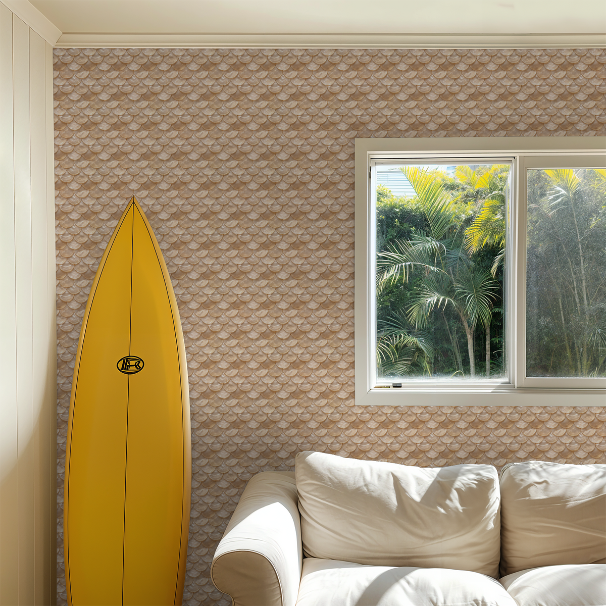 Calypso wallpaper with scallop motif in a cozy room with a surfboard and window view.