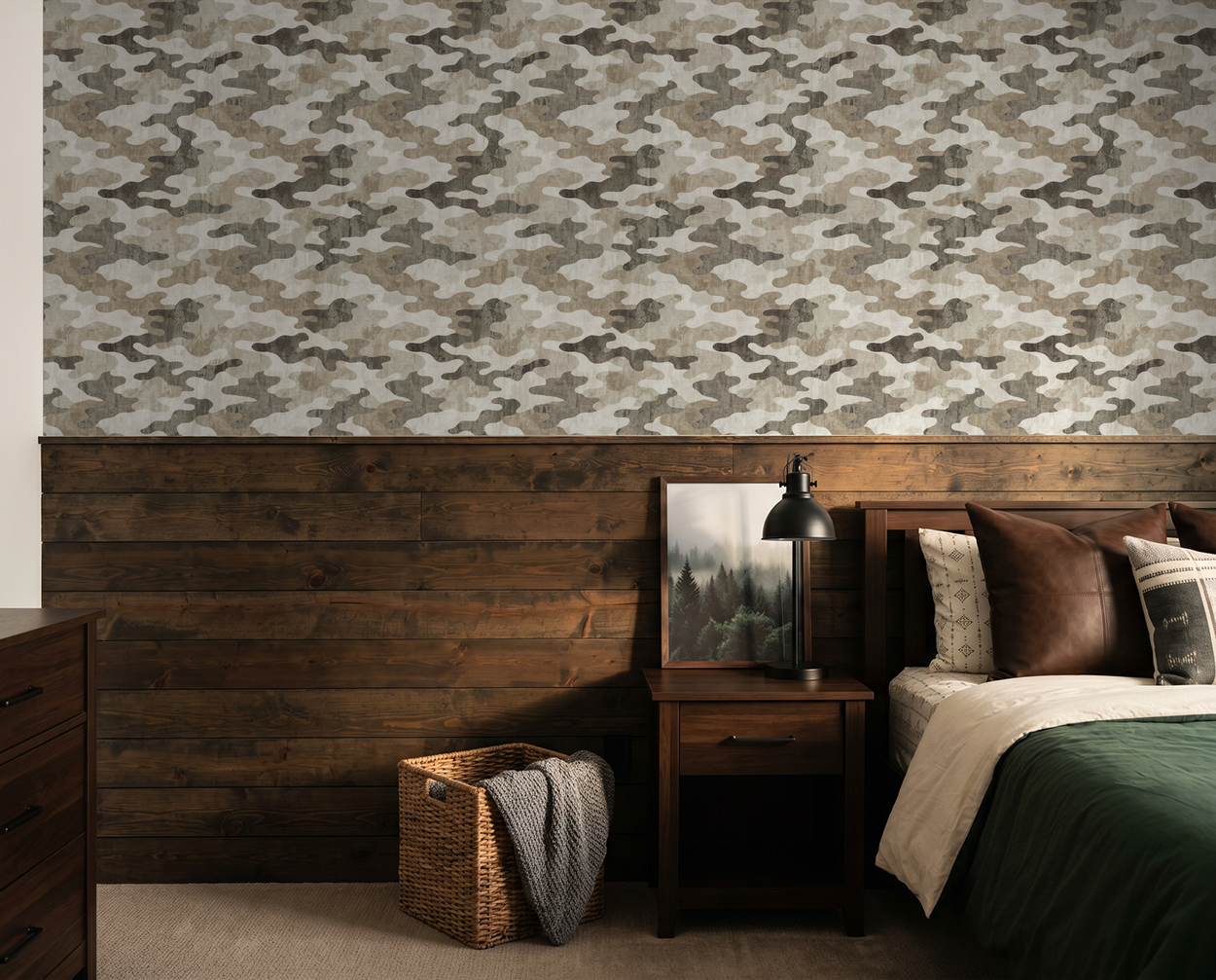 Camouflage wallpaper with earth tones in a rustic bedroom setting.