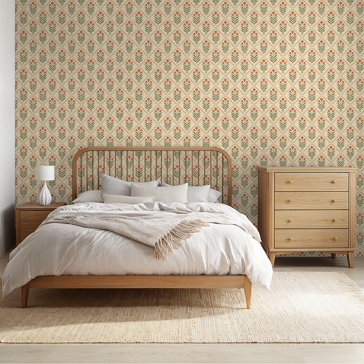 Bedroom with cream wallpaper, olive green leaves, terracotta blooms, wooden furniture.