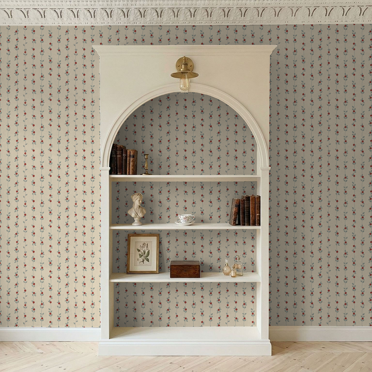 Cream wallpaper with red floral vines in vintage room with bookshelf.