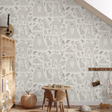 "Child's room decorated with Wall Blush Woodland (Cream) Wallpaper, animal pattern focus."