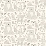 "Wall Blush Woodland (Cream) Wallpaper showcasing animal patterns in a well-lit nursery room."