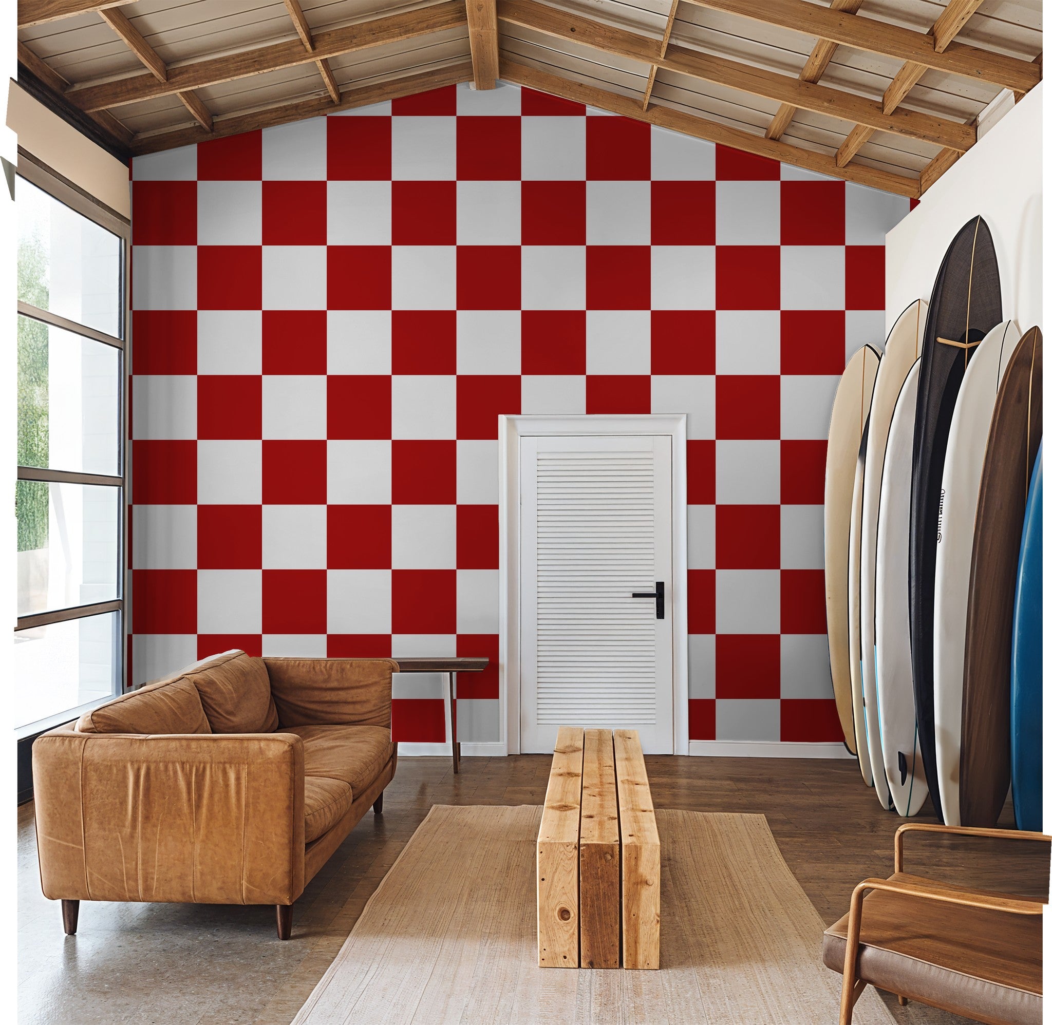 Crimson Grid large red and white checkered wallpaper in modern room with surfboards.