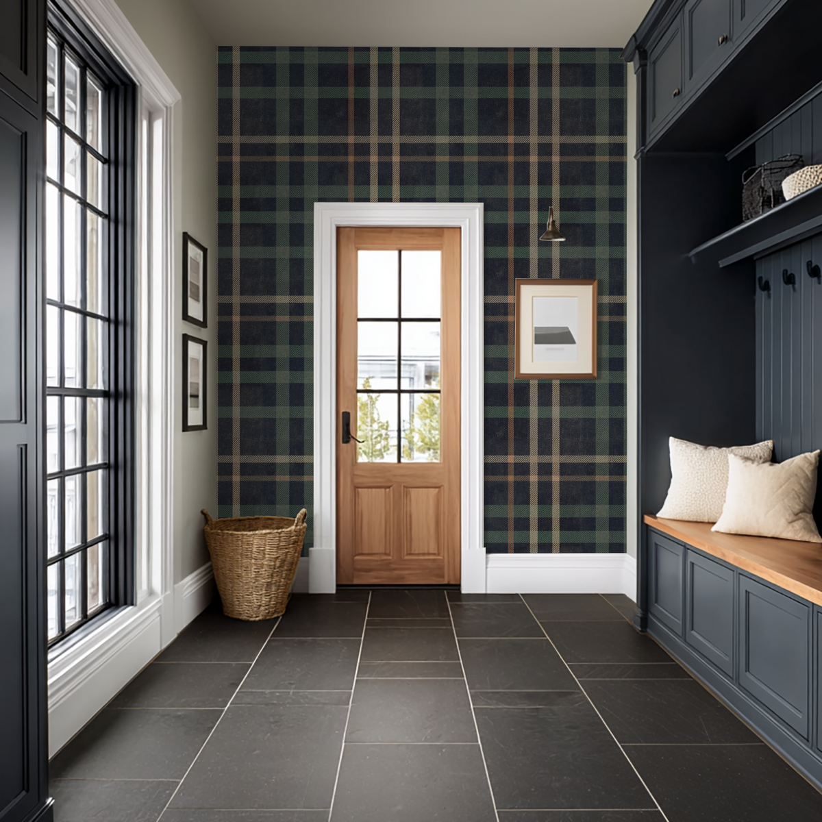 Entryway with deep navy and green plaid wallpaper, wooden door, and cozy seating.