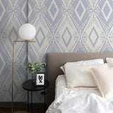 "Gloria Wallpaper by Wall Blush in a stylish bedroom, geometric pattern focus, modern home decor."