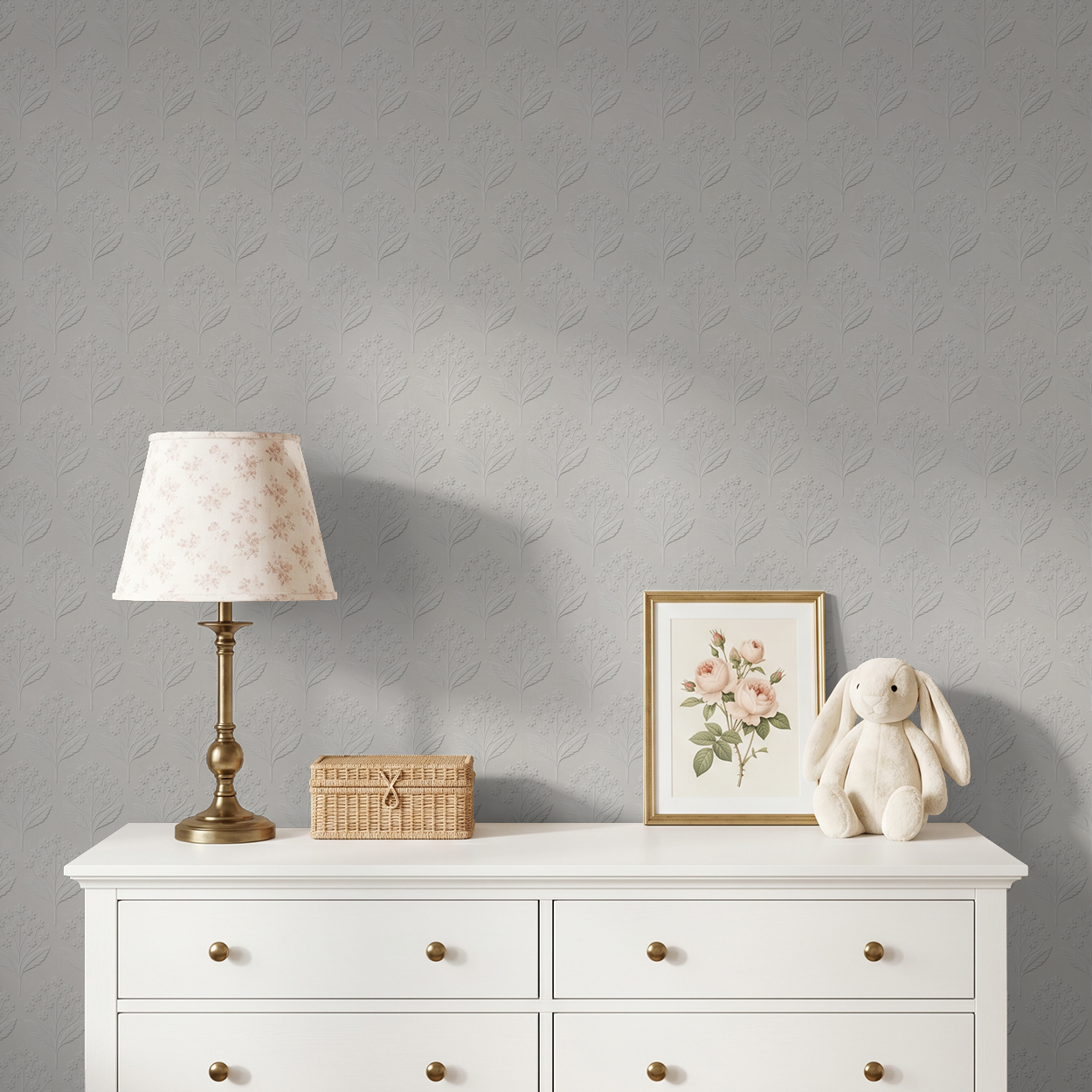 Elegant floral embossed wallpaper in serene bedroom setting with lamp and decor.