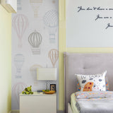 Ellie Wallpaper by Wall Blush SG02 showcased in a cozy bedroom with hot air balloon designs, enhancing room decor.

