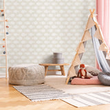 "Keep Swimming Wallpaper by Wall Blush in a cozy children's room with playful teepee and wooden accents."