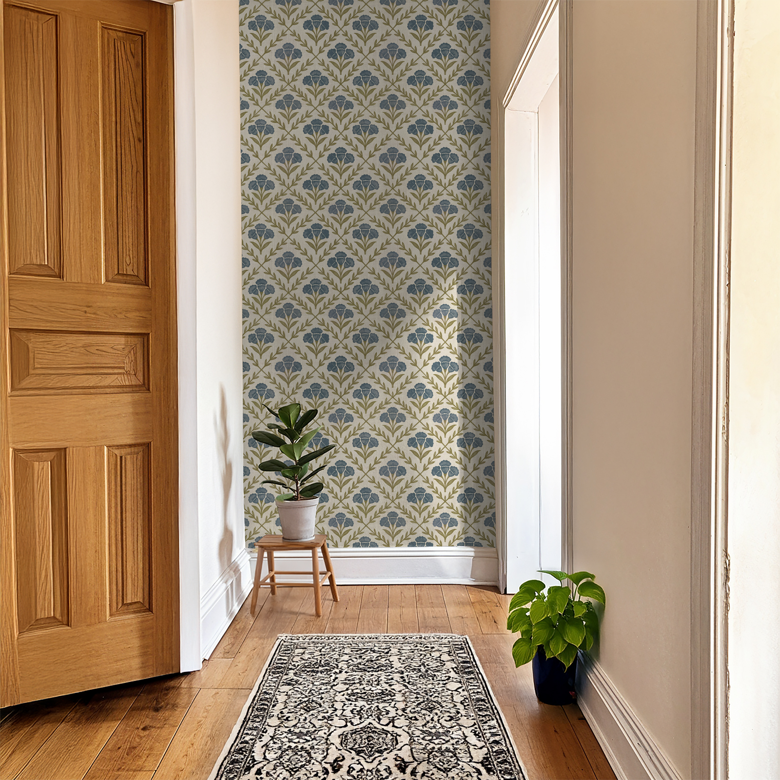 Floral wallpaper with blue and olive pattern in a bright hallway.