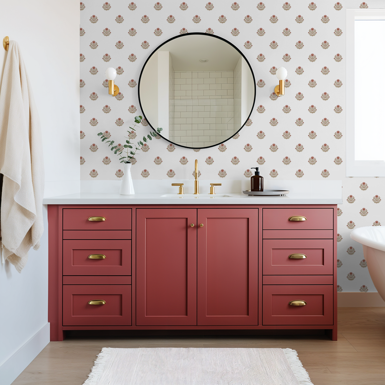 Floral wallpaper with delicate motifs in a modern bathroom with red vanity.